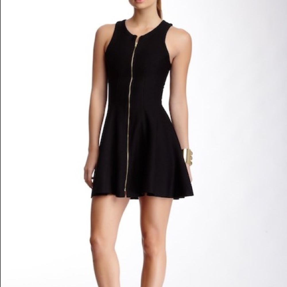 Sleeveless zip knit fit and flare dress.